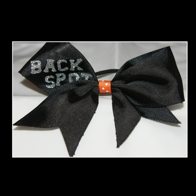 Stunt group bow - backspot" 2 in black grosgrain ribbon with an orange & white polka dots center cheer bow