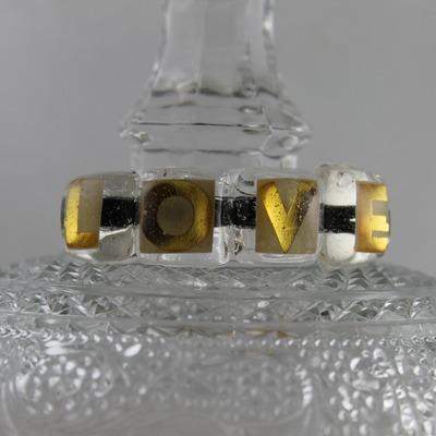 Gold l.o.v.e.  bracelet 
