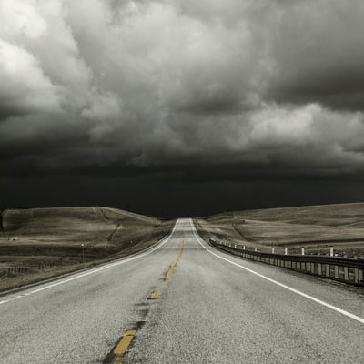 Stormy road through fog on lustre paper