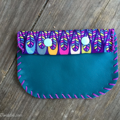 Dark teal and brown leather w/colorful fabric