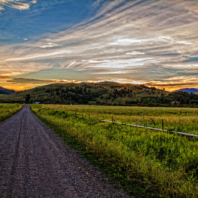Dirt road at sunset on lustre paper