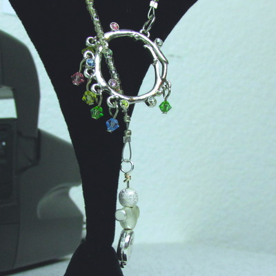 Birds nest hole in one necklace