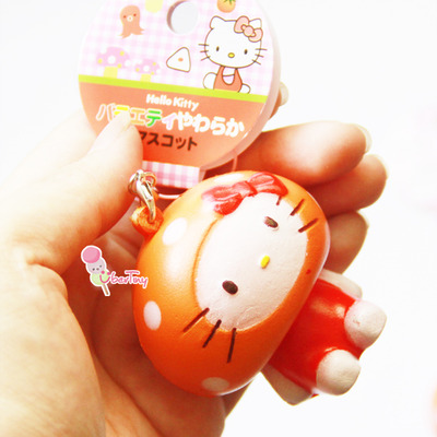 Hello kitty orange costume squishy (with tags)