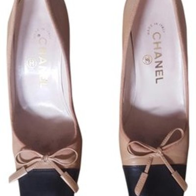 Chanel tan and black pumps