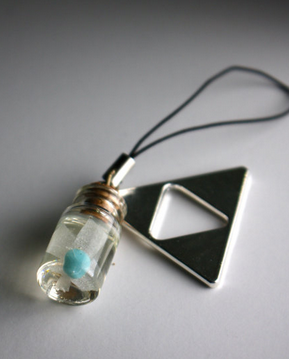 Legend of Zelda Fairy (they glow in the dark) and Triforce cellphone charm