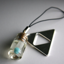 Legend of Zelda Fairy (they glow in the dark) and Triforce cellphone charm