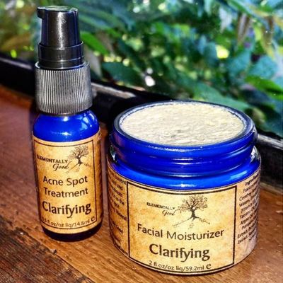 Clarifying acne fighting facial moisturizer and spot treatment