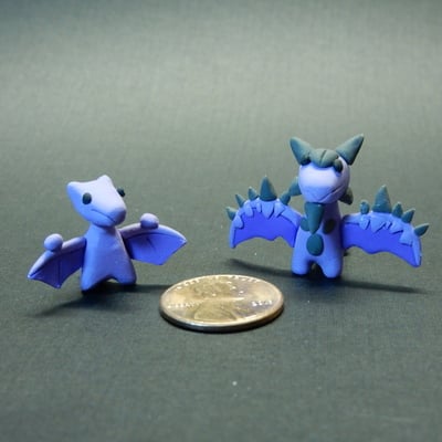  mini pokemon #142, and mega aerodactyl