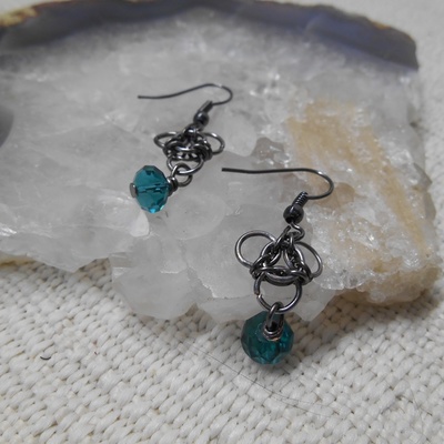 Gunmetal celtic knot and "emerald" earrings.