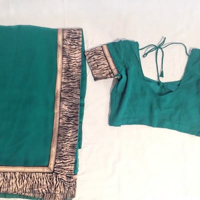 Emerald green animal print sari