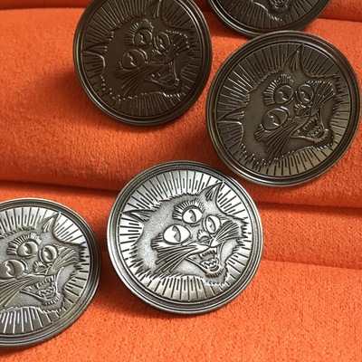 Three eyed cat die struck enamel pin