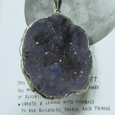 Large silver plated purple geode