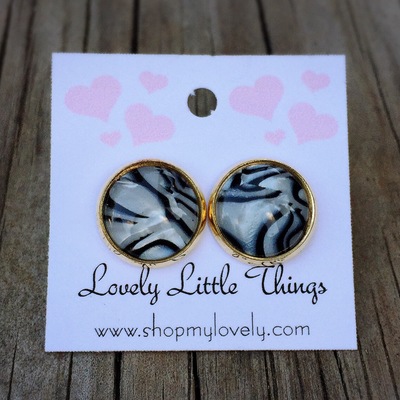 12mm zebra studs with gold setting 