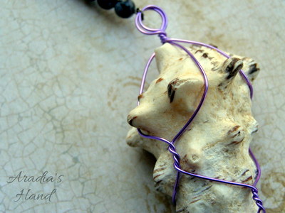 Caged Seashell Pendulum