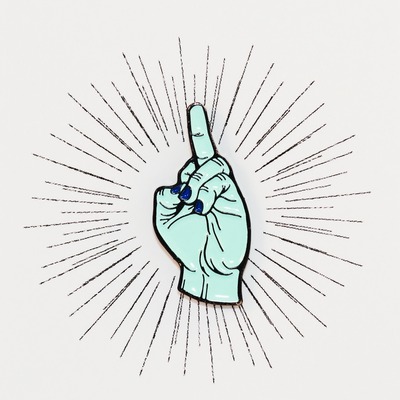 Turned up enamel pin