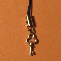 Key Cell Charm