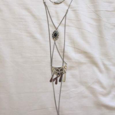 Long silver layered statement necklace