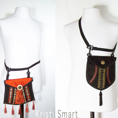 Black and bronze clip on pocket or small purse. 