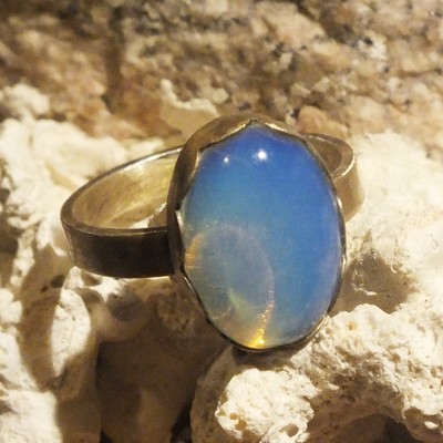 Natural white opal and sterling silver ring by thornbird studios