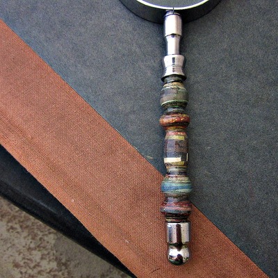 Paper beaded embellished magnifying glass