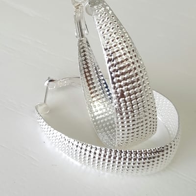 Wide silver hoop earrings 