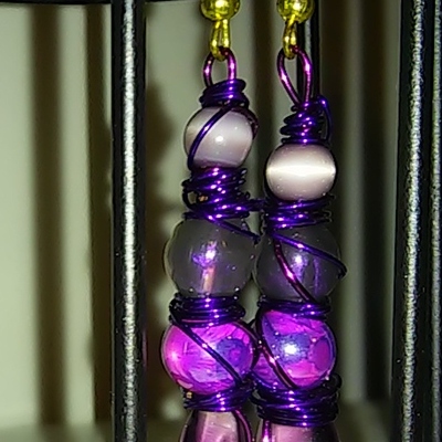 Quad beaded purple glass splatterpainted twisted metal wire art earrings with gold hooks