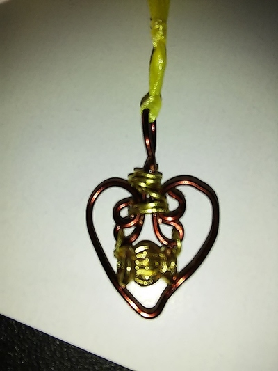 brown, gold, copper twisted heart necklace