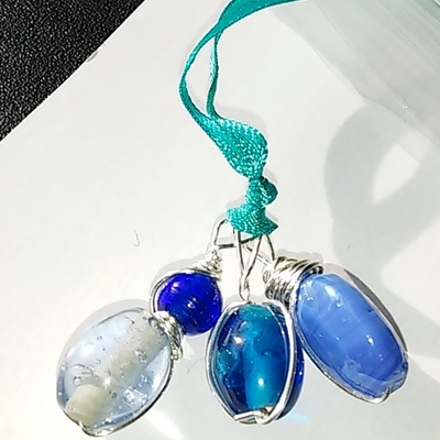 Blue triple wire wrapped pendant necklace