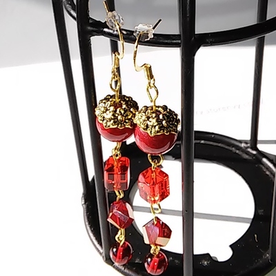 Red glass gold trim earrings