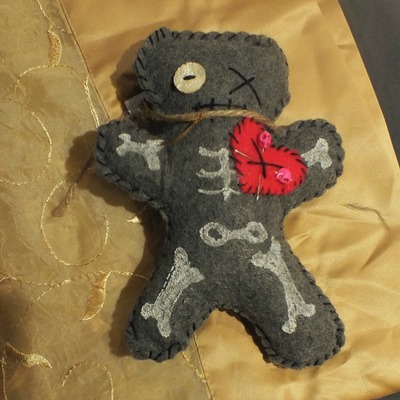 "little buttheads" hand made voodoo doll with pink pins by kat anderson