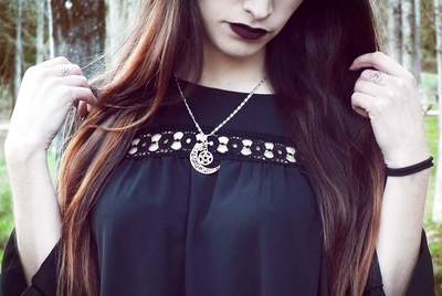 Crescent filigree moon with pentagram pendant