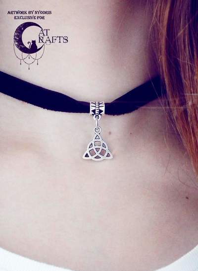 Black velvet choker with triquetra symbol