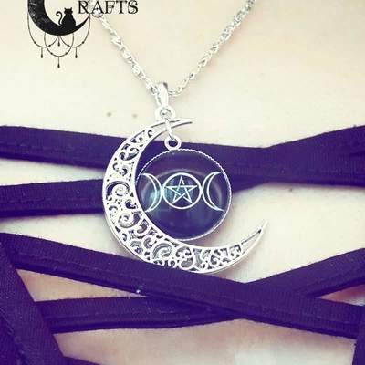 Silver necklace with filigree crescent moon and triple moon cabochon