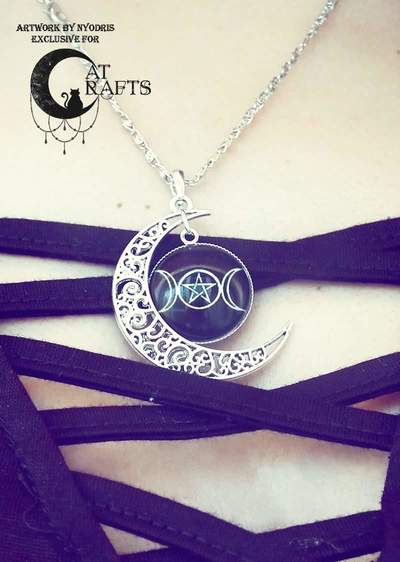 Silver necklace with filigree crescent moon and triple moon cabochon