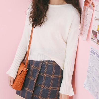 Double-breasted plaid skirt