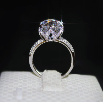 R583 SILVER FLOWER RING