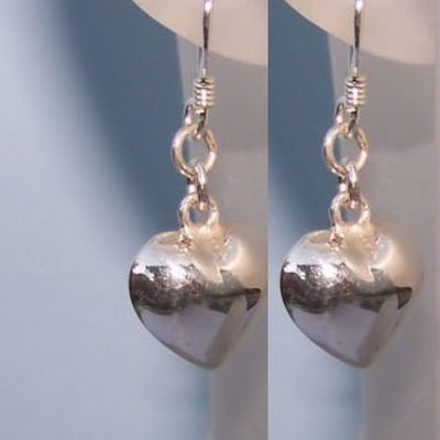 Pair of sterling silver dangle heart earrings