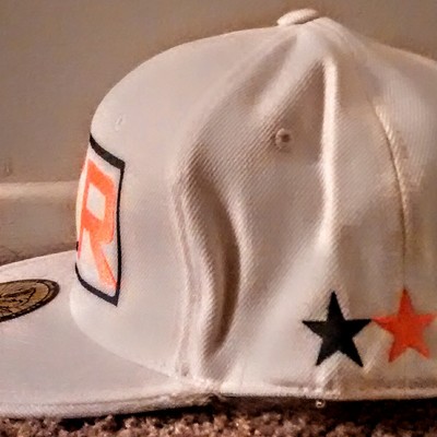 E.r (emt) (white,orange,&black) fitted hat with stars.