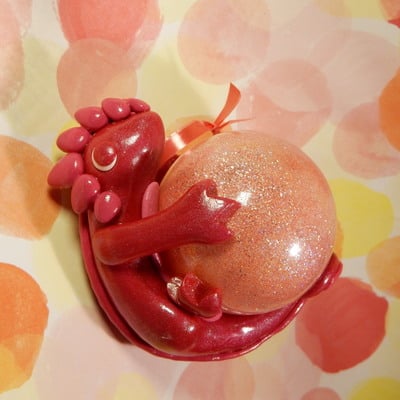 Pink sphere ornament dragon