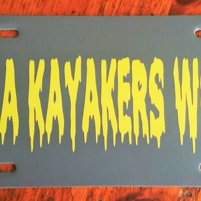 It's a kayakers world poly license plate hand made predrilled holes