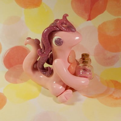 Pink glitter potion dragon