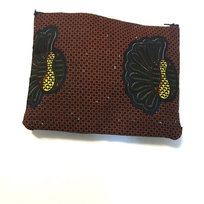 Zip top clutch- shy peacock print
