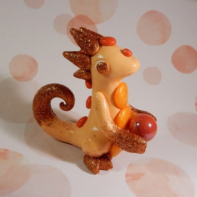 Orange glitter dragon