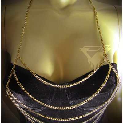 "5 tiers to fear" queen chain vest in gold  