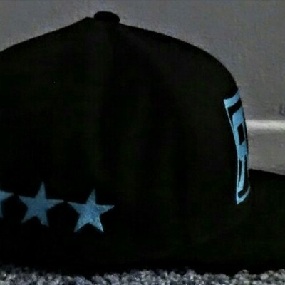 E.r (emt) (black&teal blue) fitted hat with stars.
