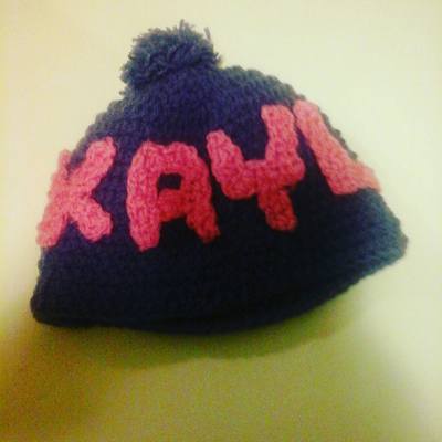 Personalized crochet child beanie hat with puffball
