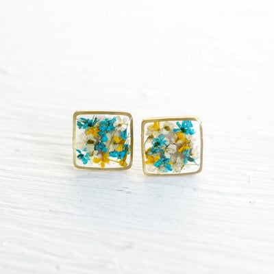 Real pressed flower and resin stud earrings in blues, yellows, and white mix
