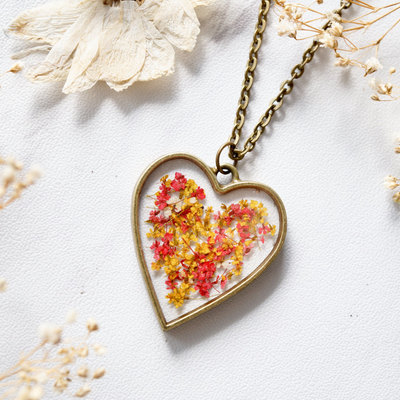 Real dried flowers in resin heart necklace in red yellow mix