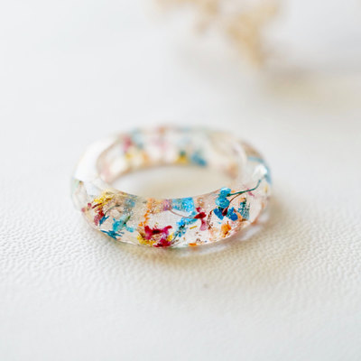 Real pressed flower and resin ring in party mix