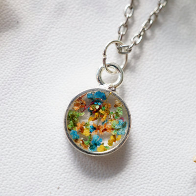Real dried flowers in resin necklace in blue green orange yellow mix